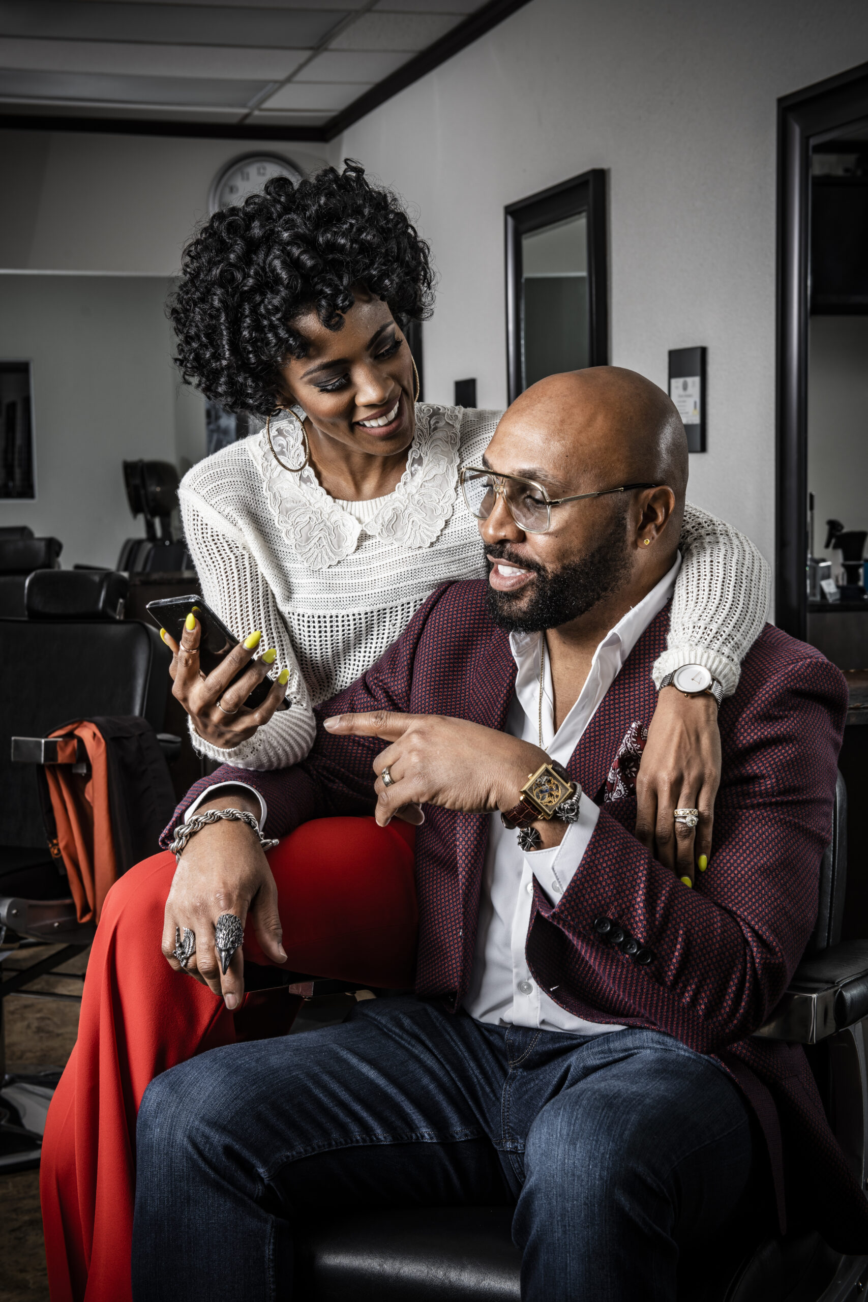 Cox Alumni Courtney Caldwell and her husband Tye Caldwell, pose at Salon74 by Tye and their We Work space, Monday, December 17, 2018. They developed the app ShearShare to help salons and barbers fill empty chairs.